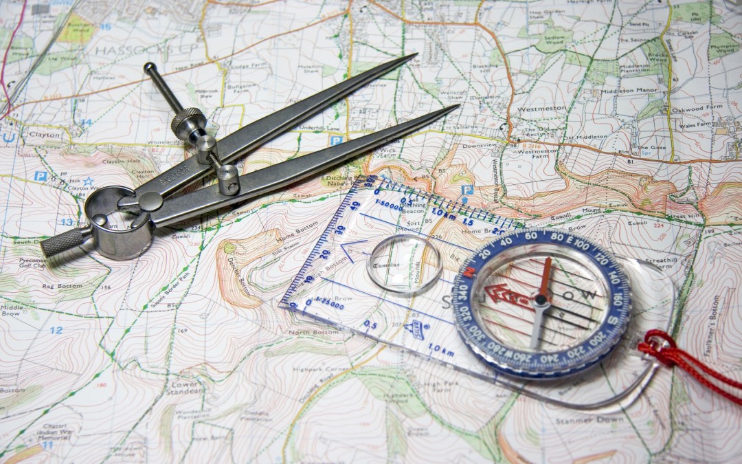 Roadmap with compass and calipers.